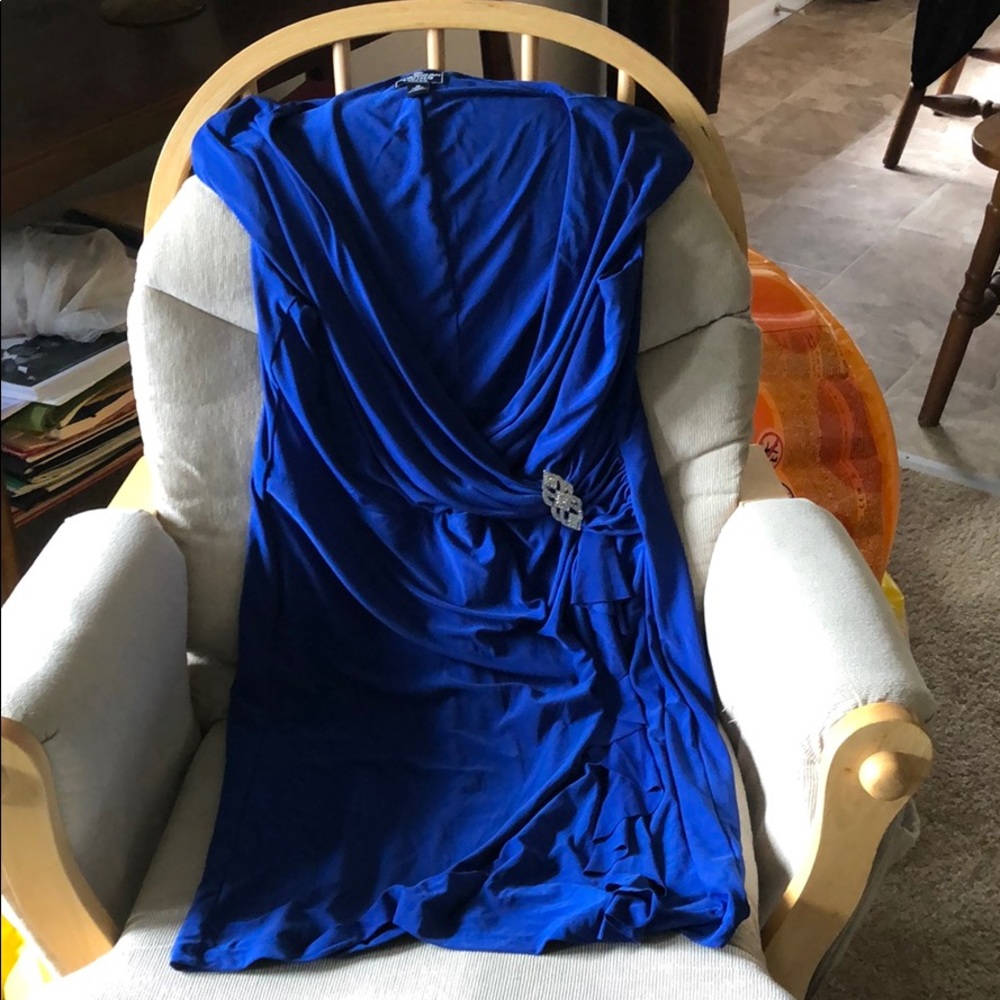 Blue faux wrap dress with brooch